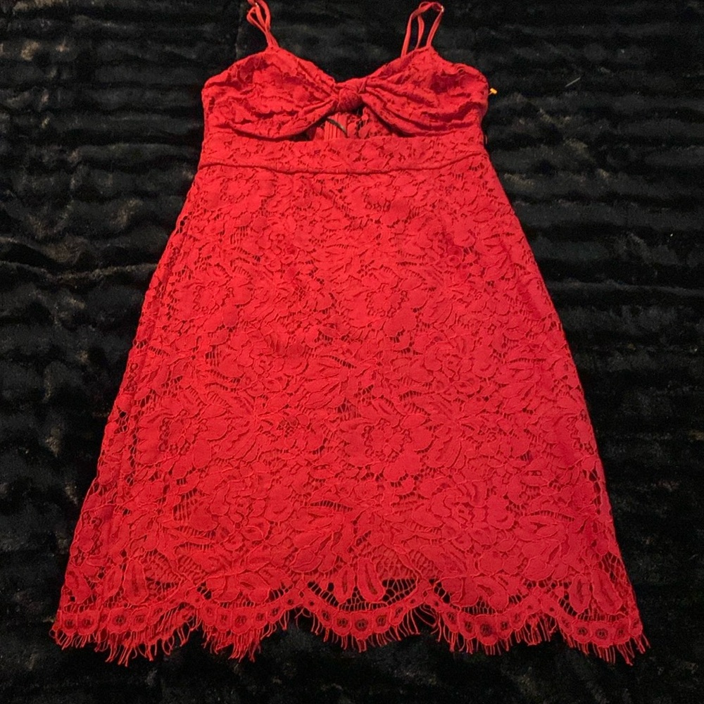Red Laced dress with peep mid section and back split